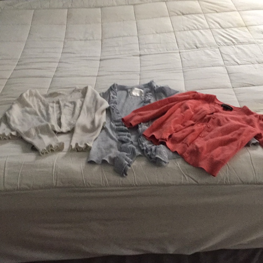 Three girls sweaters